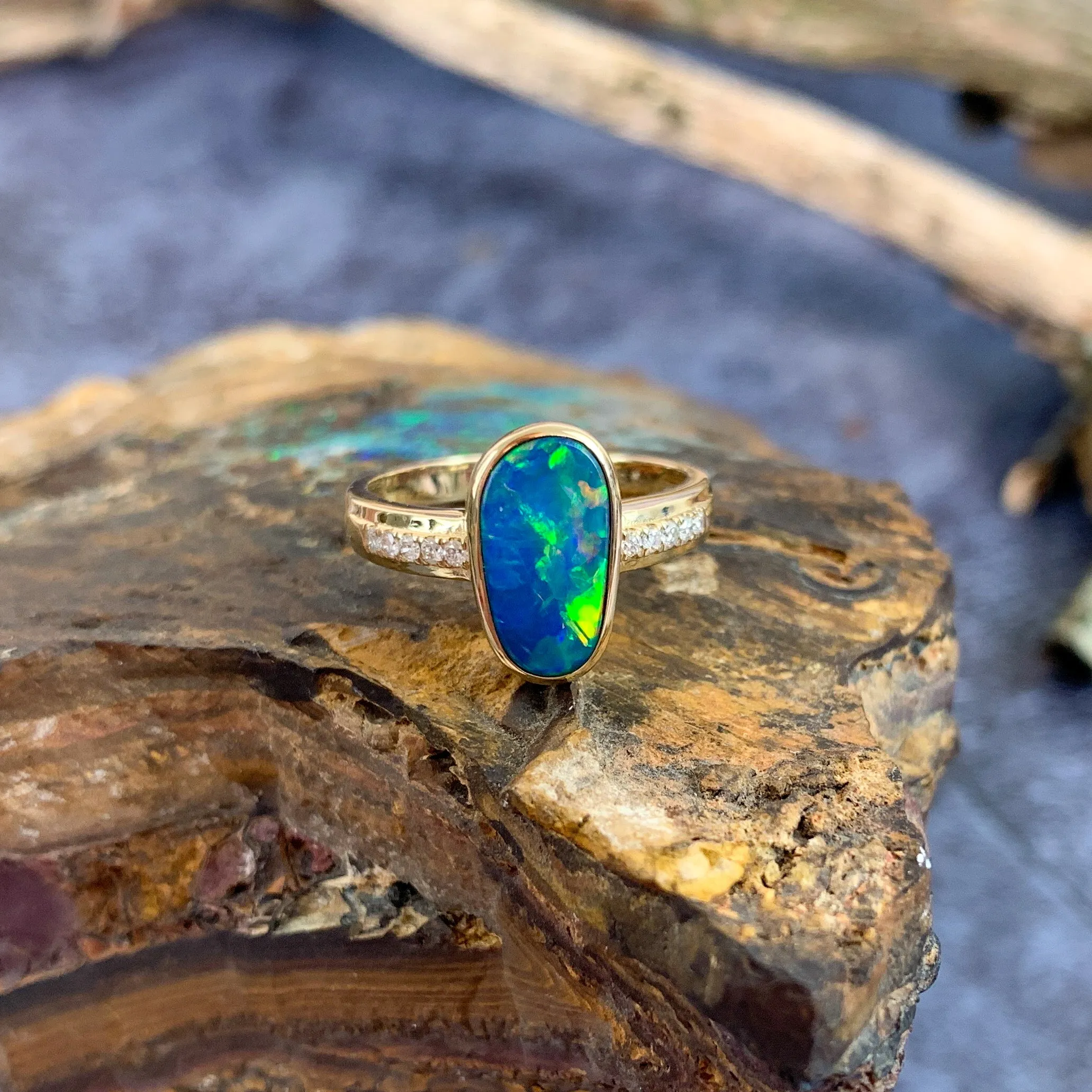 14kt Yellow Gold Oval shaped opal doublet and diamond ring