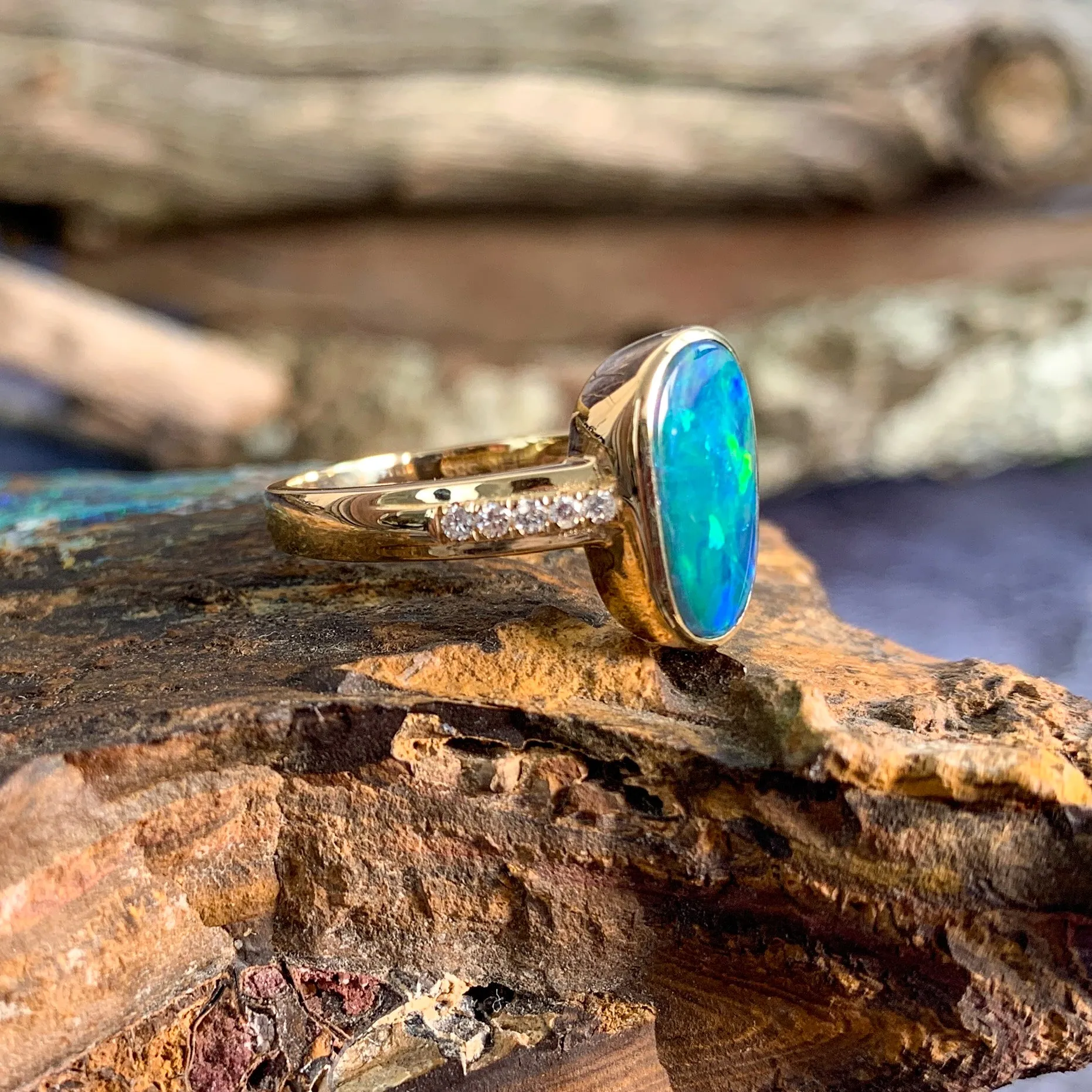 14kt Yellow Gold Oval shaped opal doublet and diamond ring