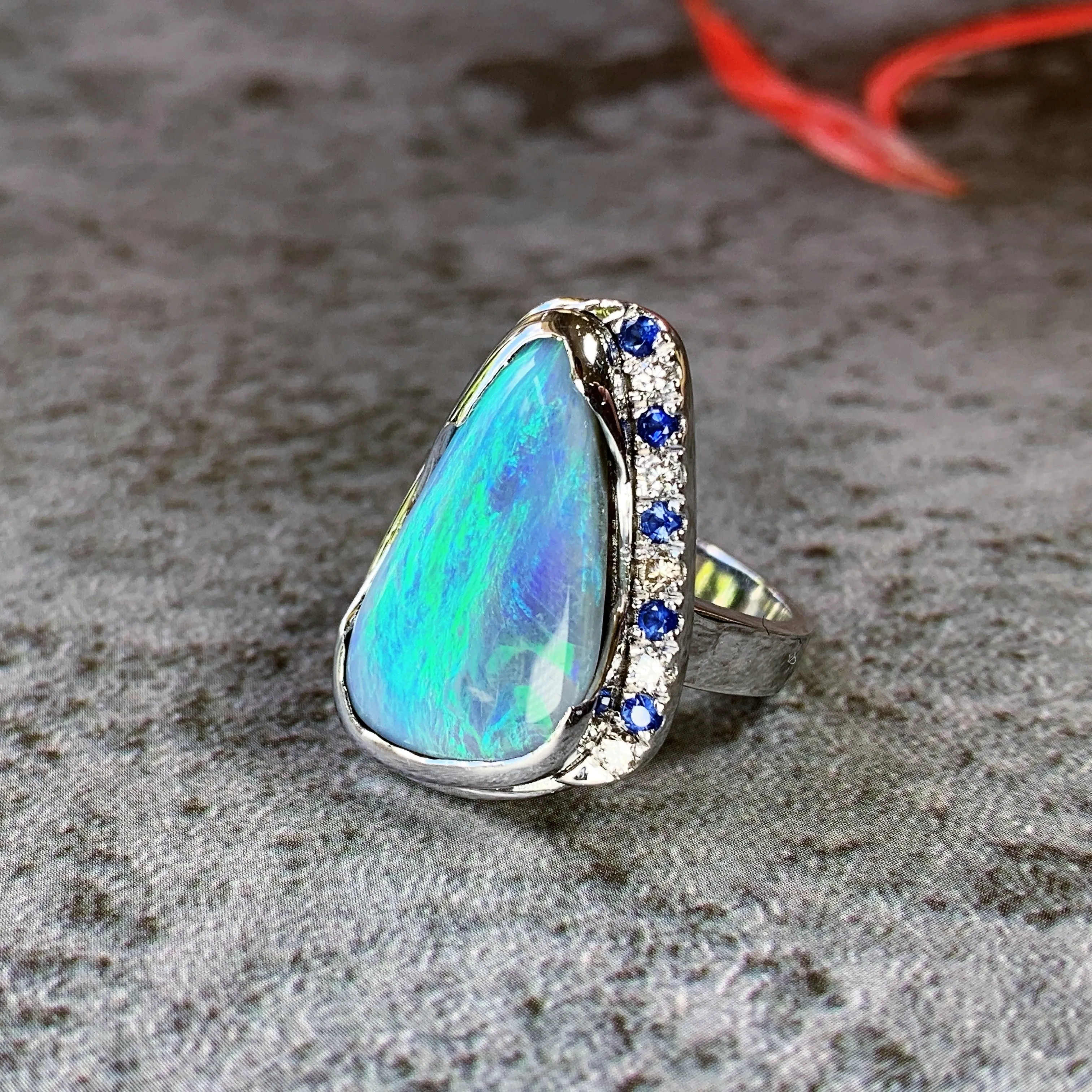 18kt White Gold bezel set Black Opal, Sapphire and Diamond ring