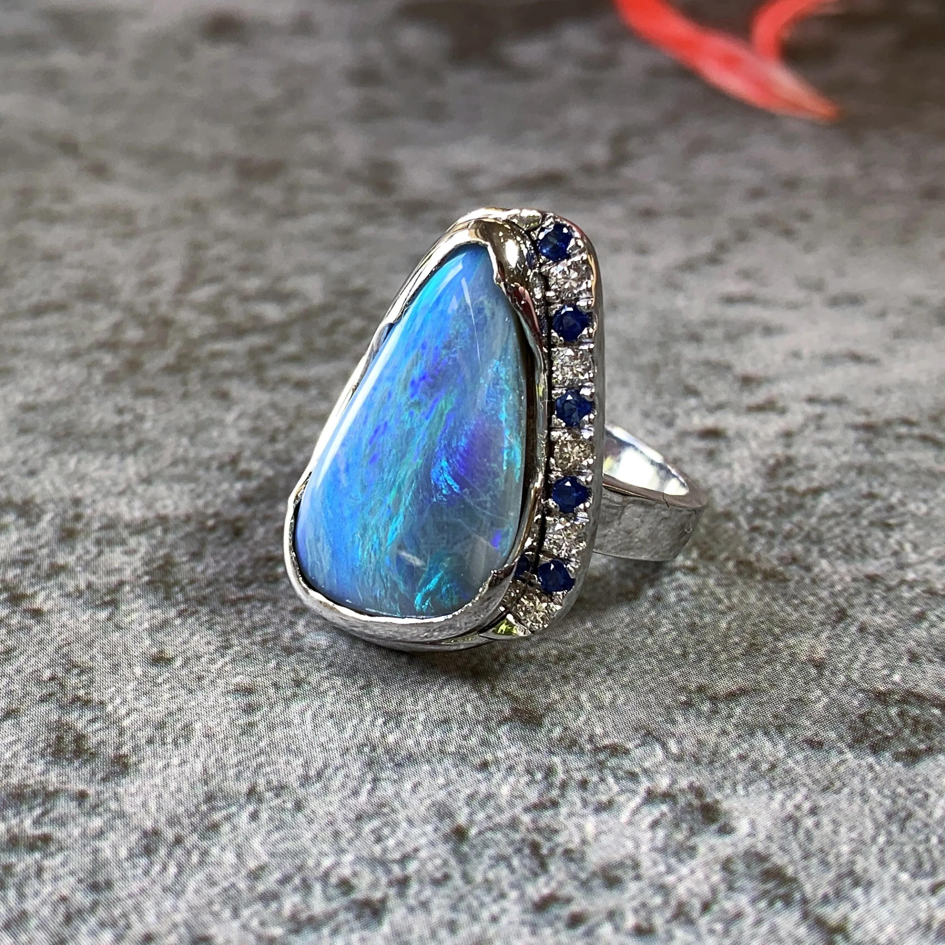 18kt White Gold bezel set Black Opal, Sapphire and Diamond ring