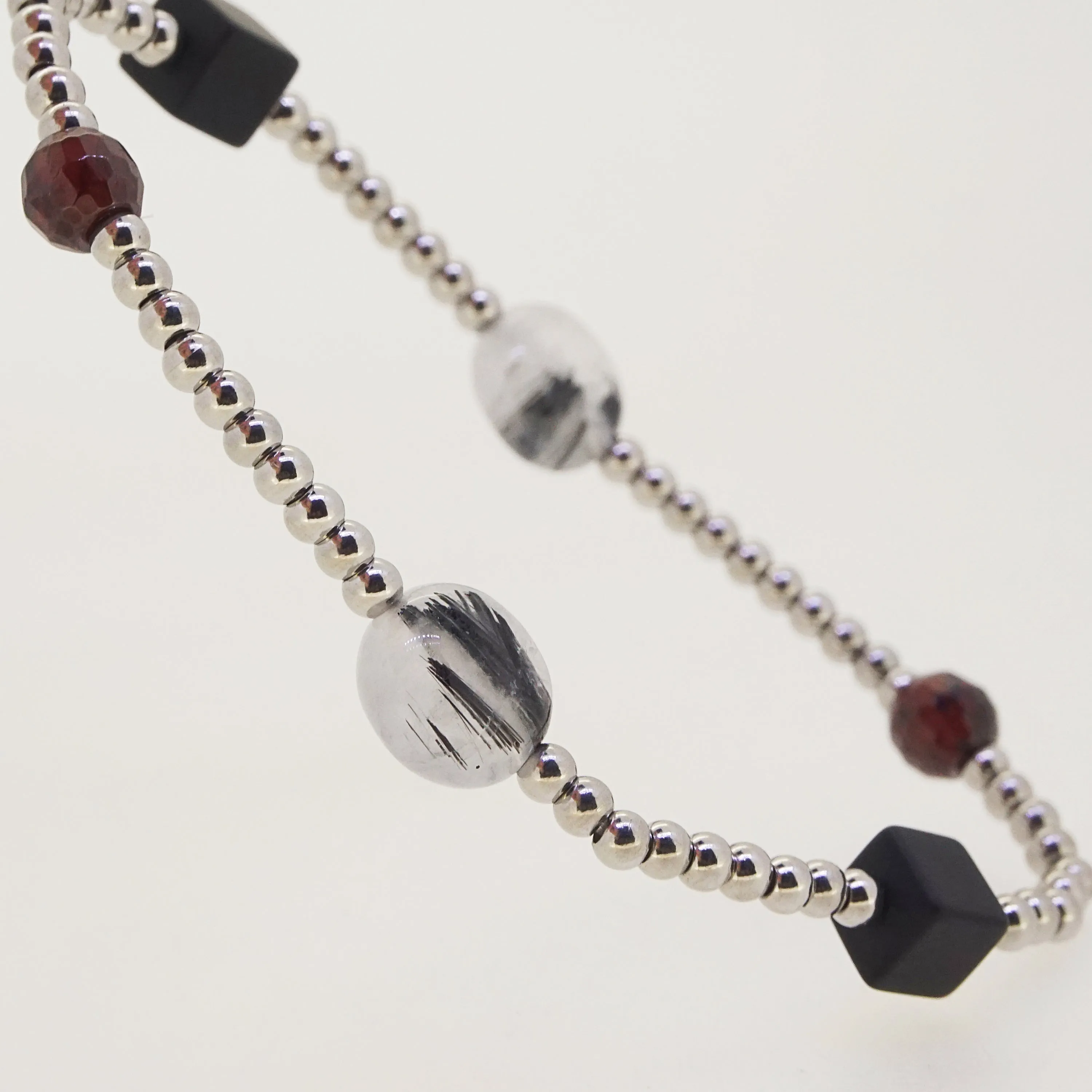 Black Onyx, Almandine Garnet, and Black Tourmalinated Quartz