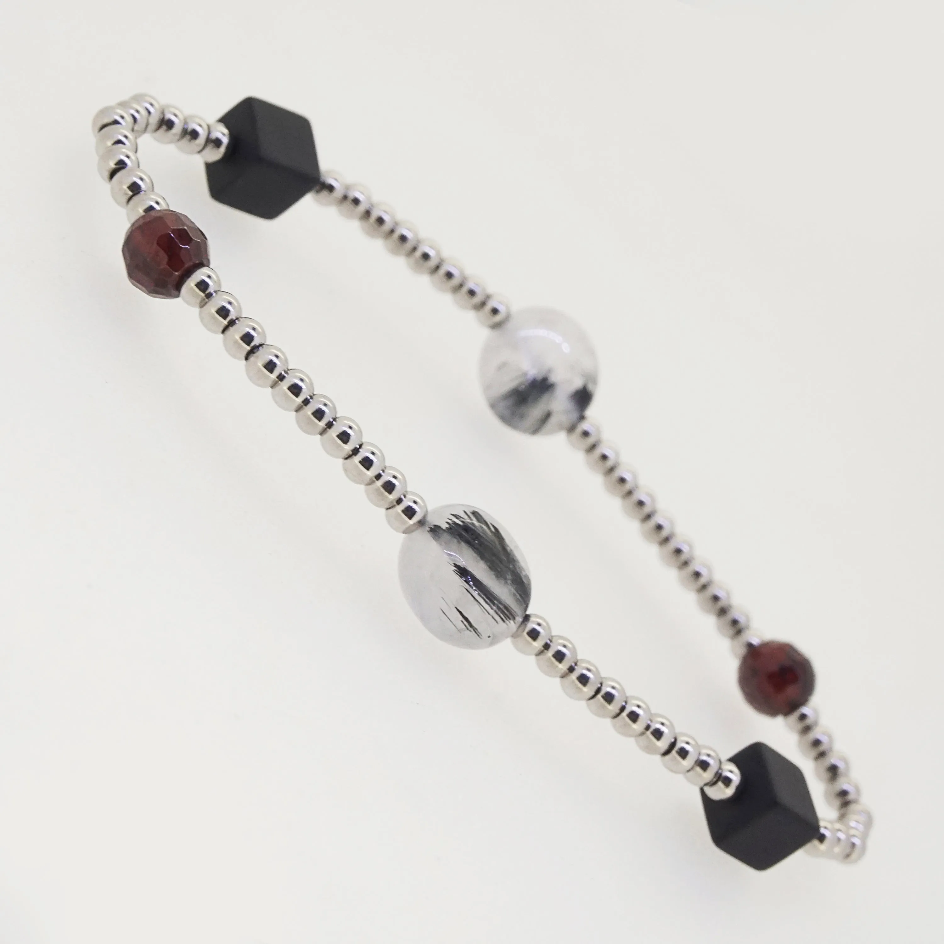 Black Onyx, Almandine Garnet, and Black Tourmalinated Quartz