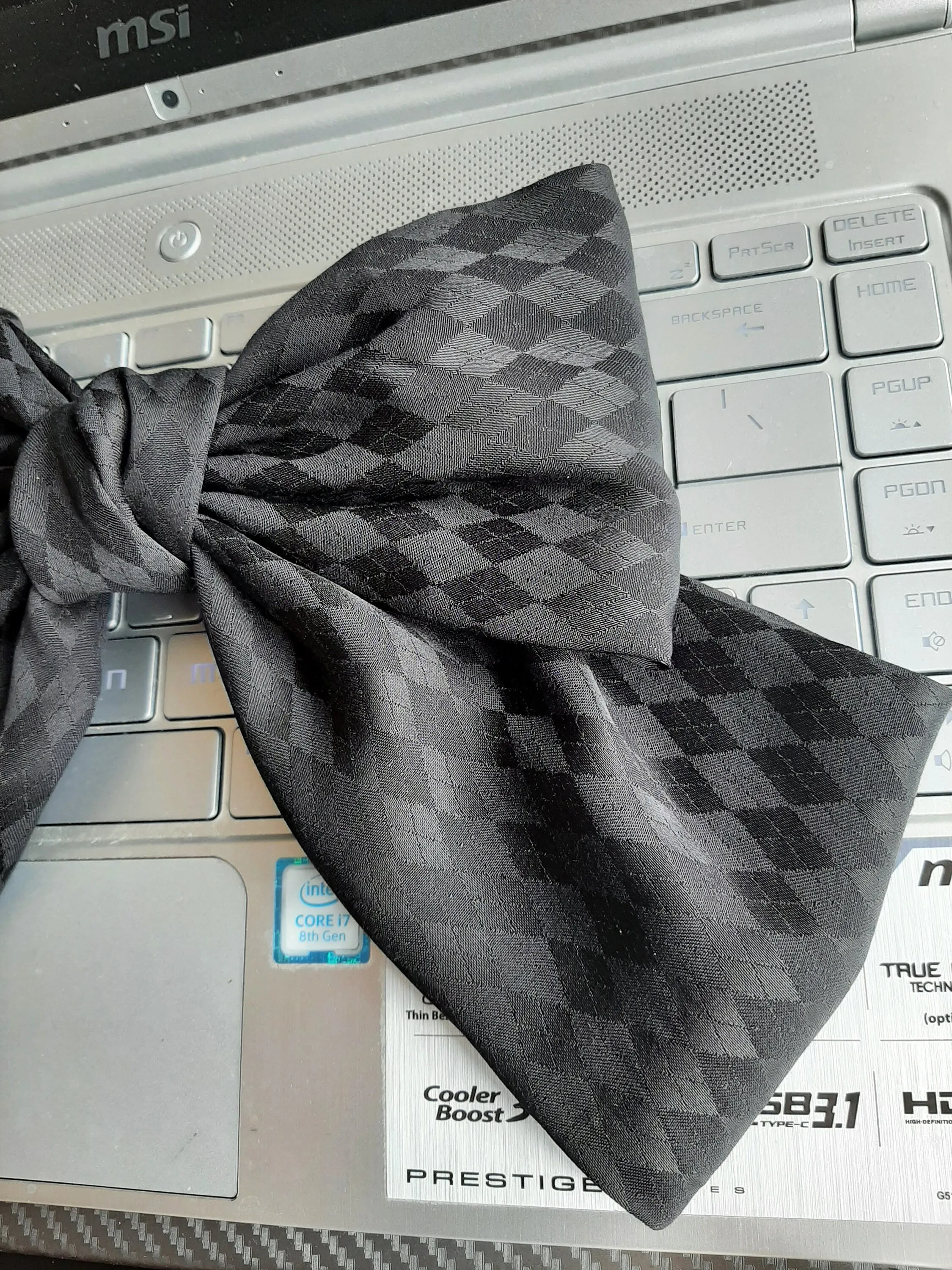 Diamond pattern satin hair bow