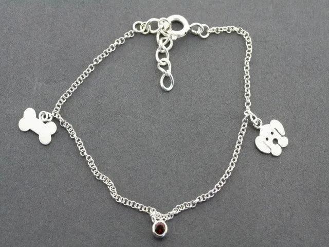 dog, bone and garnet bracelet