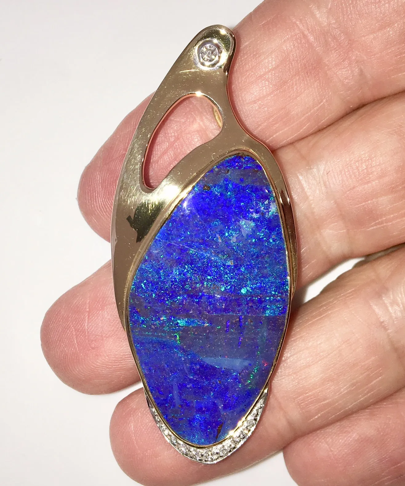 Intense Blue Blue Green solid boulder opal pendant