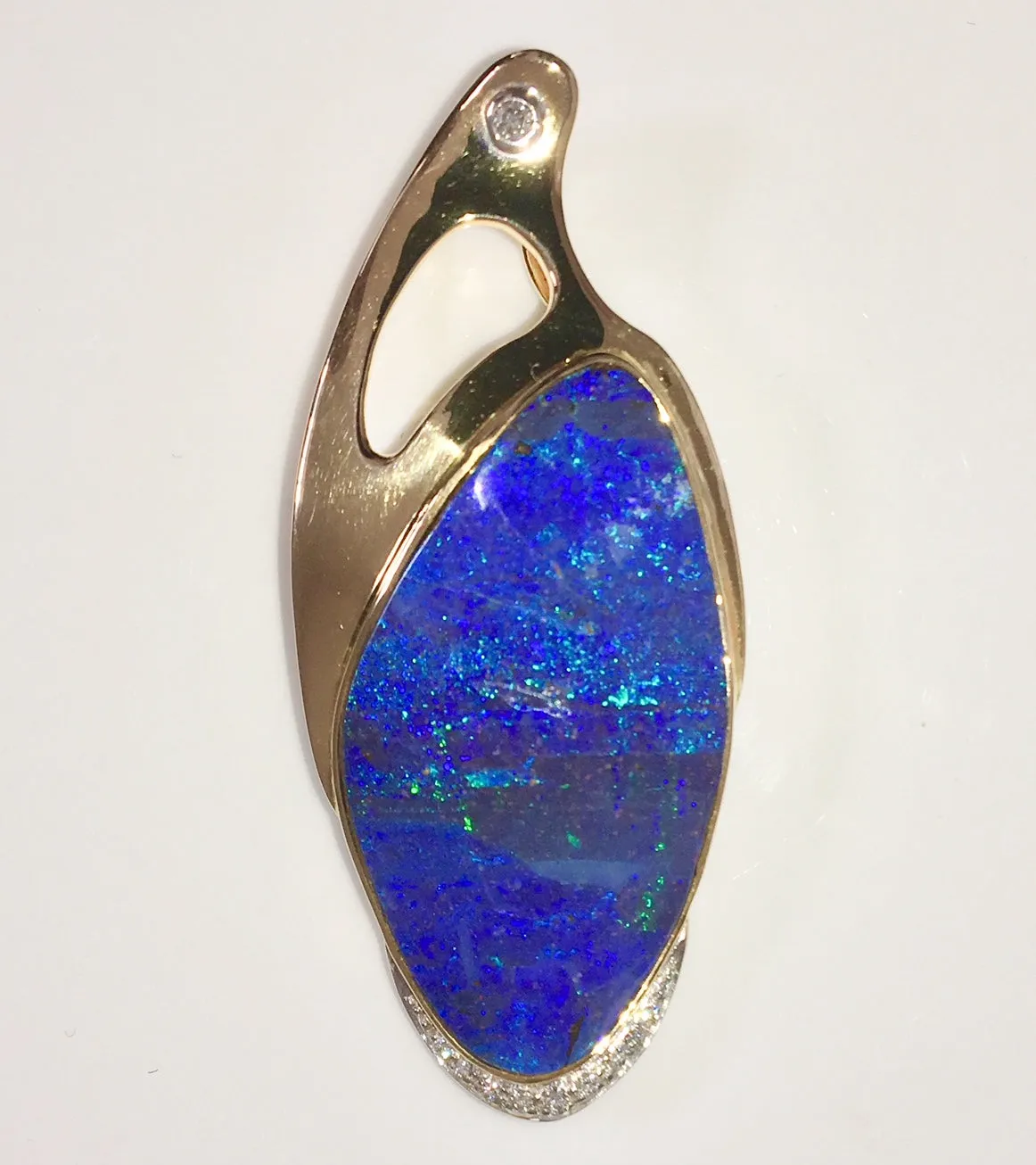 Intense Blue Blue Green solid boulder opal pendant