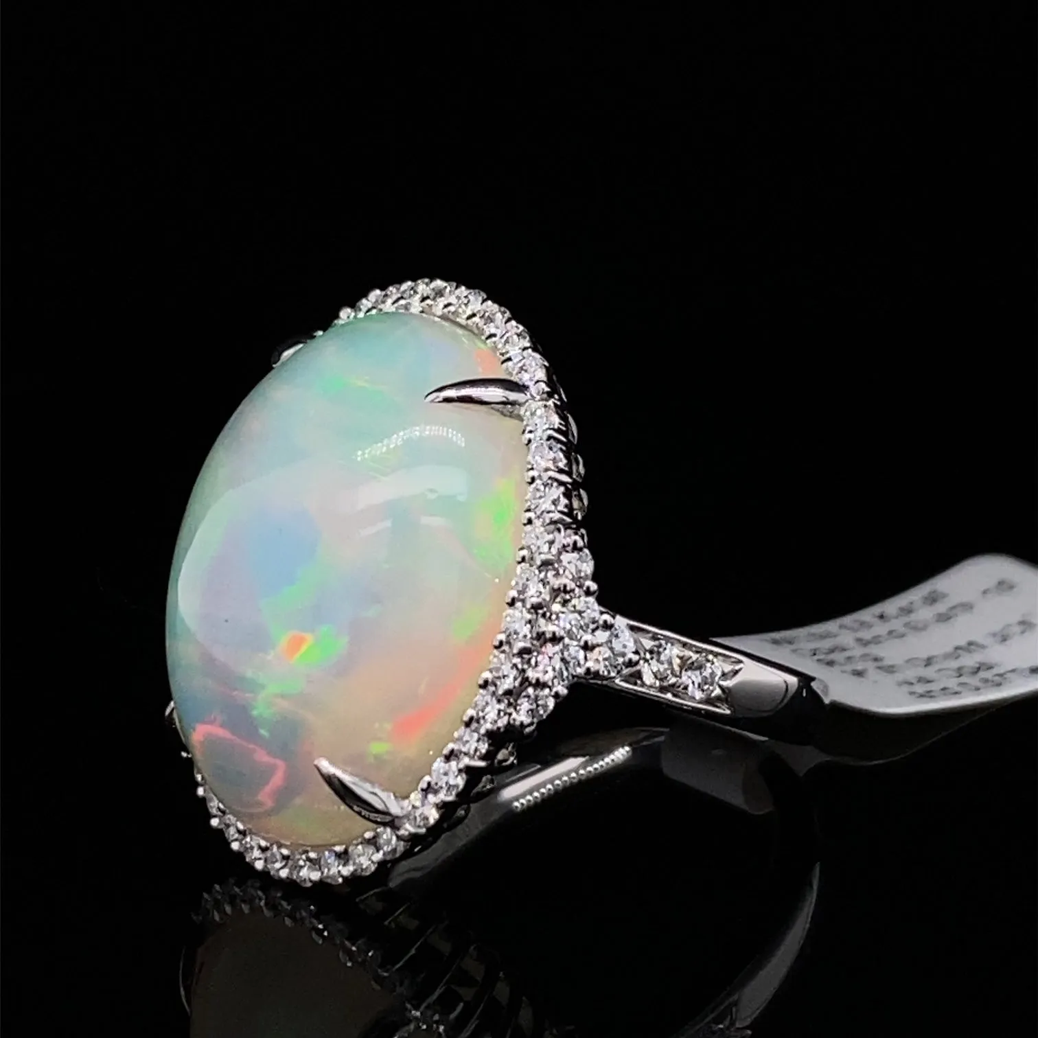 Opal and Diamond Halo Ring