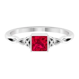 Princess Cut Solitaire Created Ruby Celtic Knot Ring in Bezel Setting